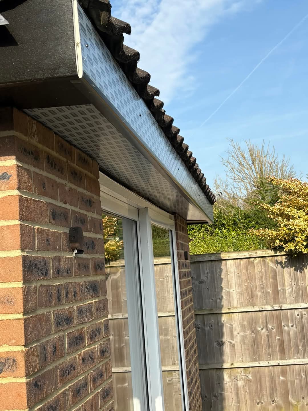 Roof repair in progress with scaffold
